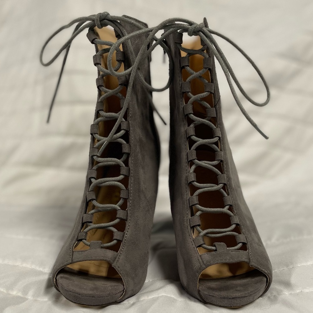 Lace up heeled booties size 6